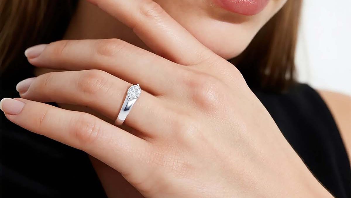 Round-cut Moissanite engagement ring in a classic solitaire setting