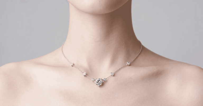 close-up of a solitaire moissanite necklace on white gold chain